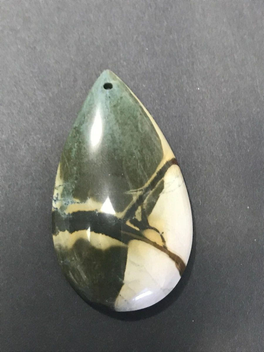 Dark green stone with black veins deals