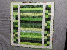 Baby or Lap Quilt 33 x 31 1/2 Well made no tears or stains.