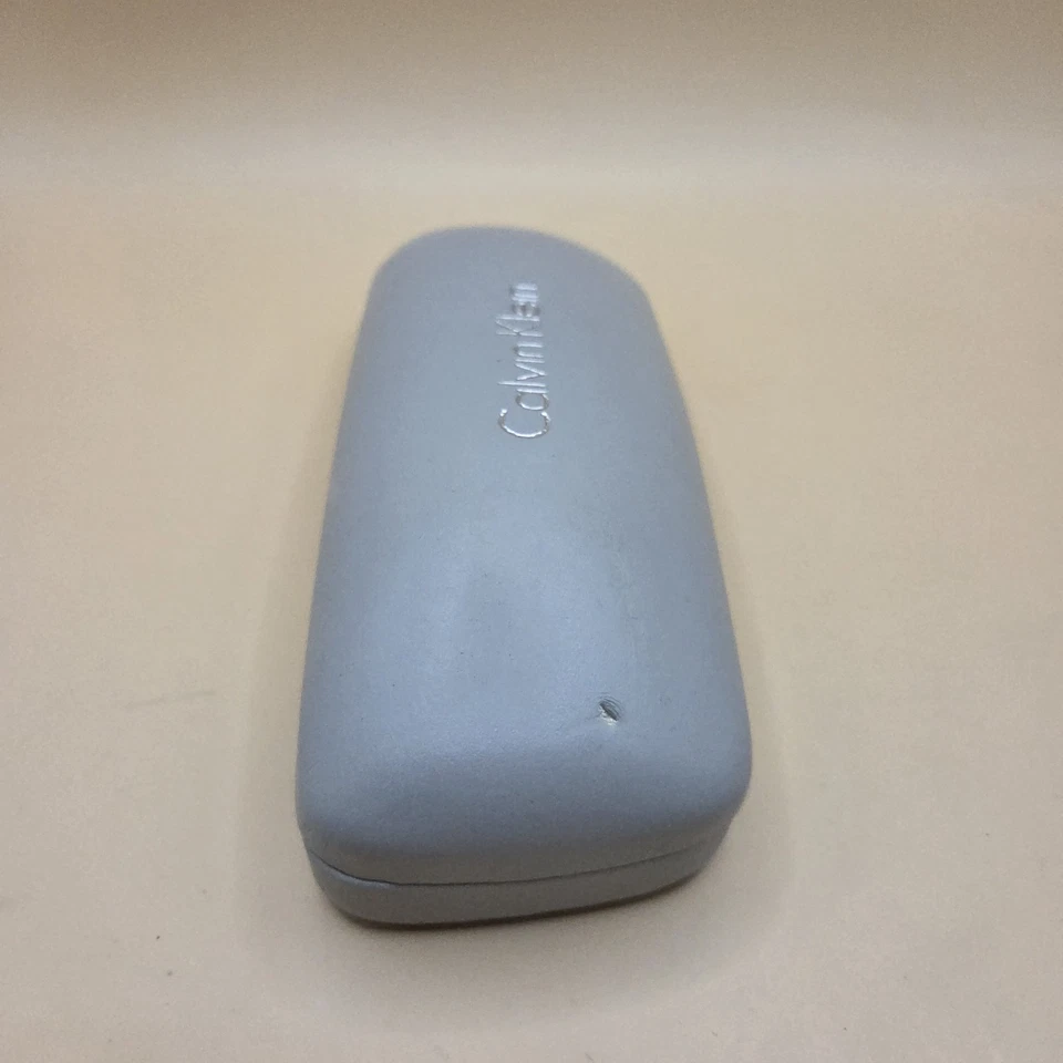 Óculos e óculos de sol Calvin Klein estojo rígido cinza prata concha de amêijoa autêntico - Imagem 4 de 4