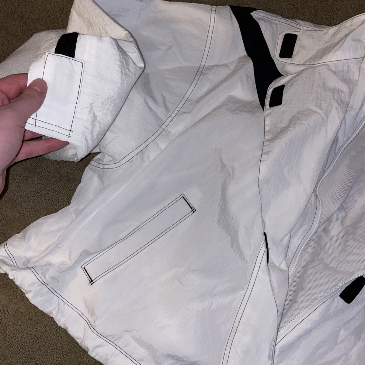 nike swoosh repel