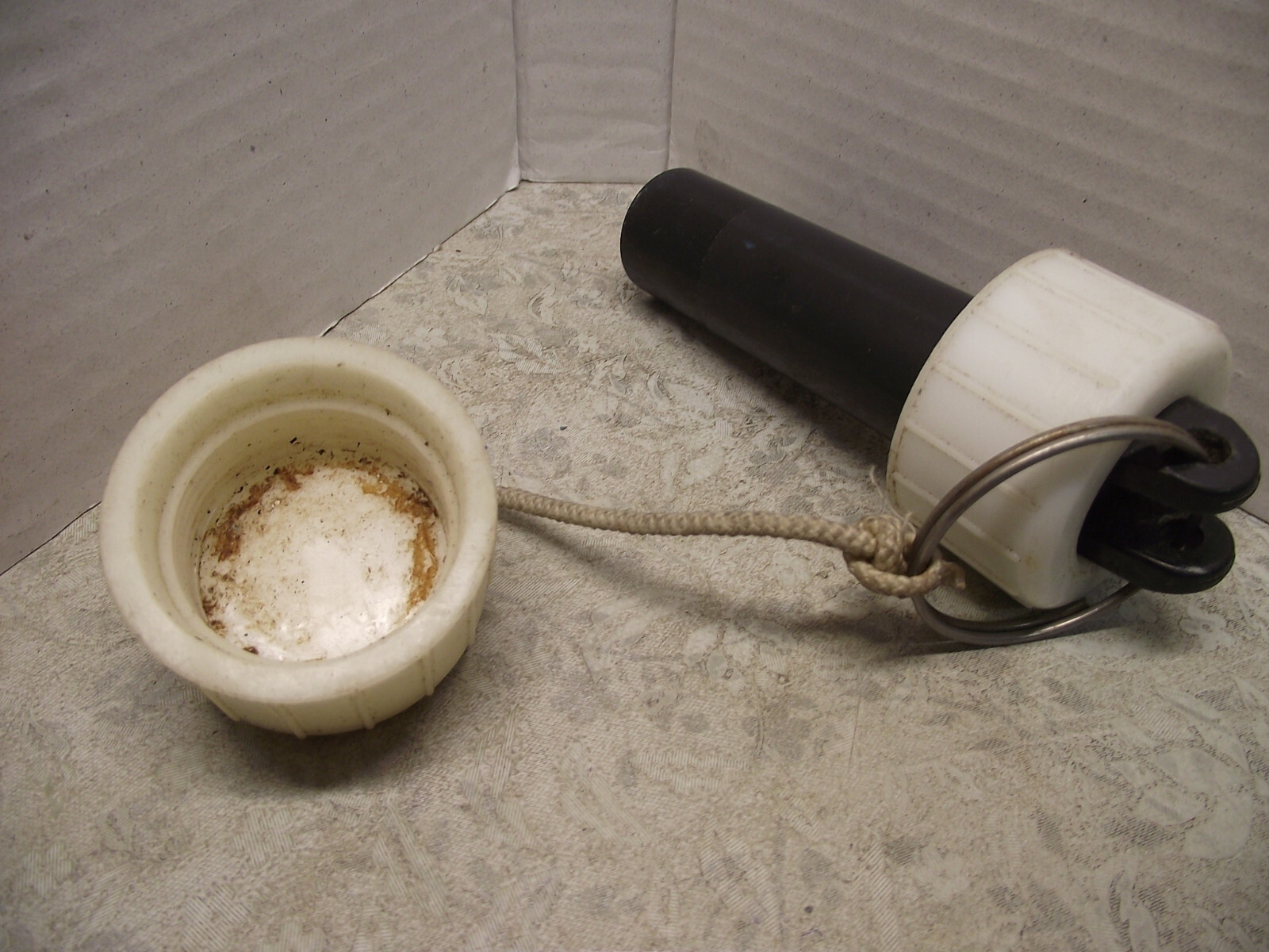 A used thruhull housing blanking plug with nut 31.4 mm diameter. 112