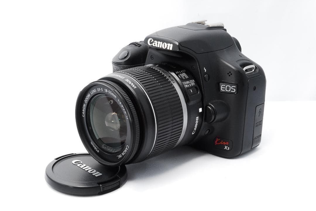 Canon EOS Kiss X3 Digital DSLR Camera with 18-55mm Lens and Extras