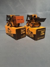 (2) 1/25 Vintage NZG New Holland L555 Super Boom Loaders, New opened for Picture