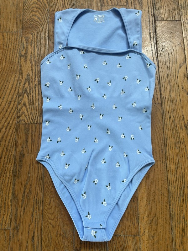 Woman’s Body Suit Size Large. New Without Tags. Never Worn!