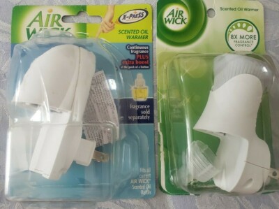2 Airwick Scented Oil Warmers Plug ins 
