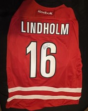 Carolina Hurricanes  Jersey + Stick Elias Lindholm 
