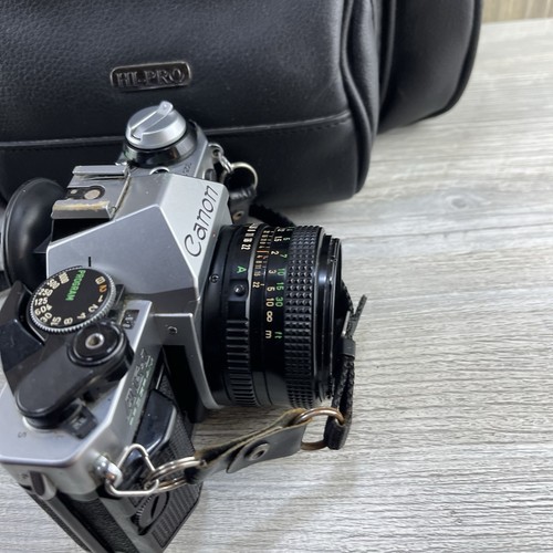 Canon AE-1 35mm SLR Film Camera w/ 50mm f/1.4 FD Lens - Picture 17 of 23