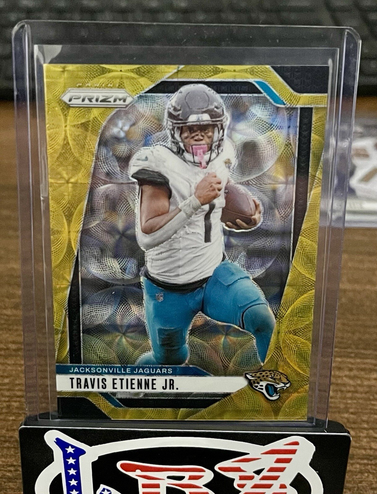 TRAVIS ETIENNE JR. 2024 PANINI PRIZM FOOTBALL GOLD CHOICE JAGUARS SSP 1/10