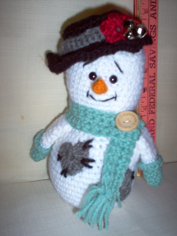 New, crochet snowman, 8" tall, green scarf and mitts.