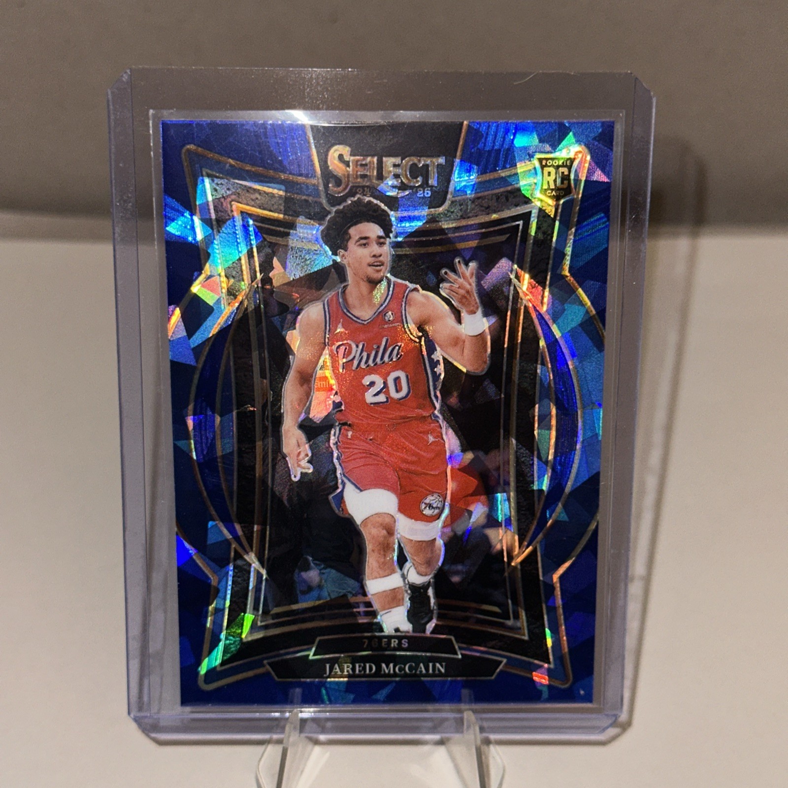 2024-25 Panini Select - Concourse Jared McCain #82 Blue Cracked Ice Prizm (RC)