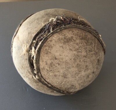 Softball Ball - Unbranded/Vintage 4'' Across/Brown - Heavy Damage