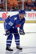 Claude Loiselle Quebec Nordiques lines up for the faceoff during a- Old Photo
