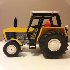ZITIANYOUBUILD Yellow Tractor Farm Machine with Spinning Wheels 1089pcs MOC