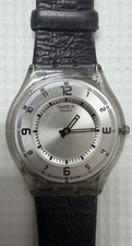 Vintage Swatch Watch Clear with Black Band Slim Design. Very Thin. Need Battery