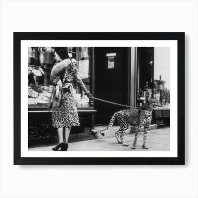 Gepard und Frau, Leopard auf einer Lea gerahmtes Wandbild Poster Leinwanddruck Bild