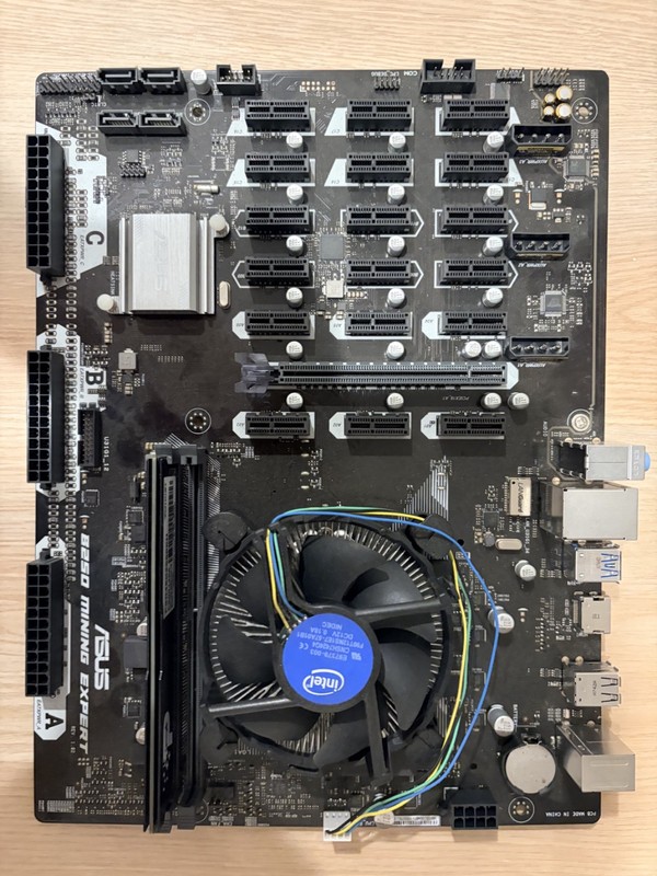 Asus B250 Mining Expert Motherboard. With CPU, heat sync and 4GB of RAM. Tested!