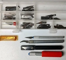 Set of 4 Craft Knife Tools Xacto with extra Blades in Plastic case new & Used