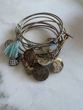 Charm braclets, silvertone. Lot of 7