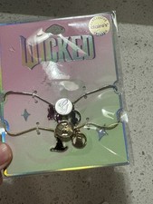 Wicked Official Gold  Silver Bracelet Set with Glinda  Elphaba Themes NWT