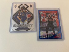 Prizm Emergent Jonathan Kuminga RC + Optic C.J. Mccollum Blue Velocity Hawks