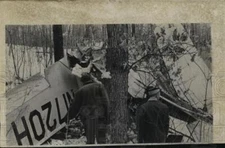 1962 Press Photo Workers viewed wreckage of twin engine airplane in Chippewa Fls