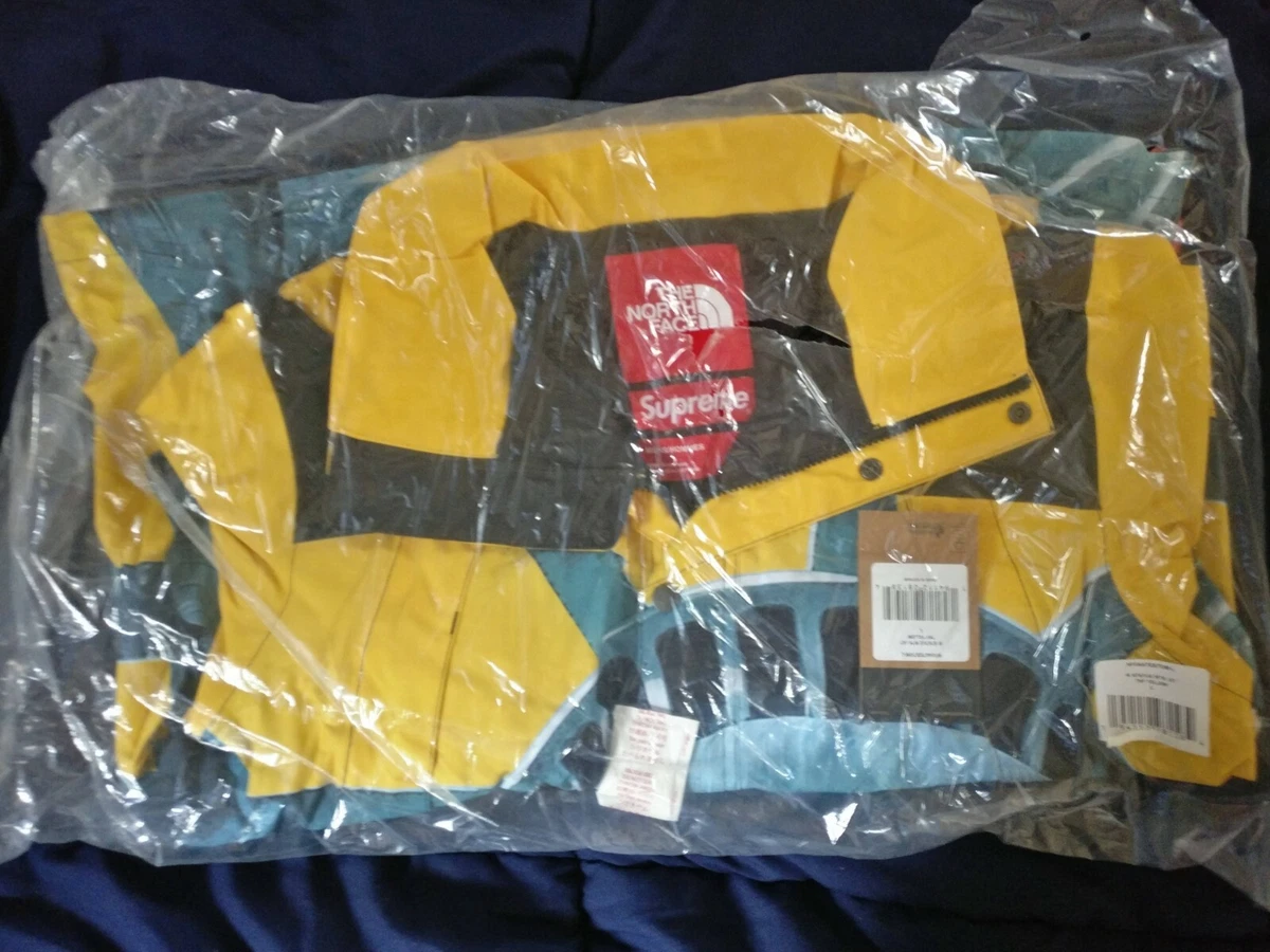 North face supreme store blue and yellow jacket