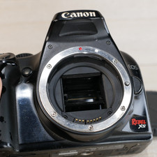 Canon EOS Rebel XS 10MP DSLR Camera Body TESTED SHUTTER 80,686