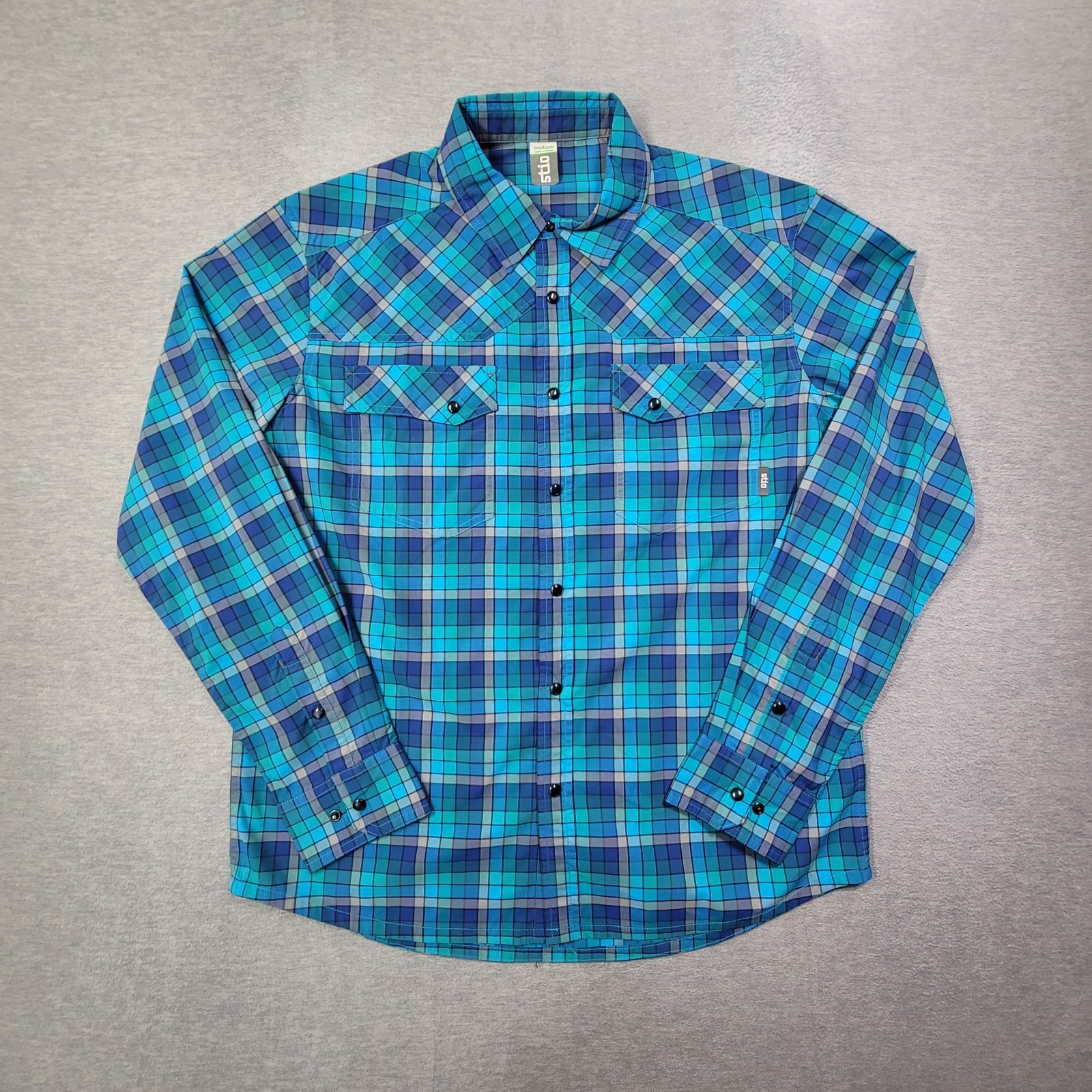 Stio Pearl Snap Shirt Mens Medium Blue Check Flap Pockets Performance Logo Eddy