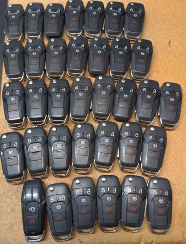 LOT OF 35 OEM FORD FLIP KEY FOB REMOTES  N5F-A08TAA 4 BUTTONS