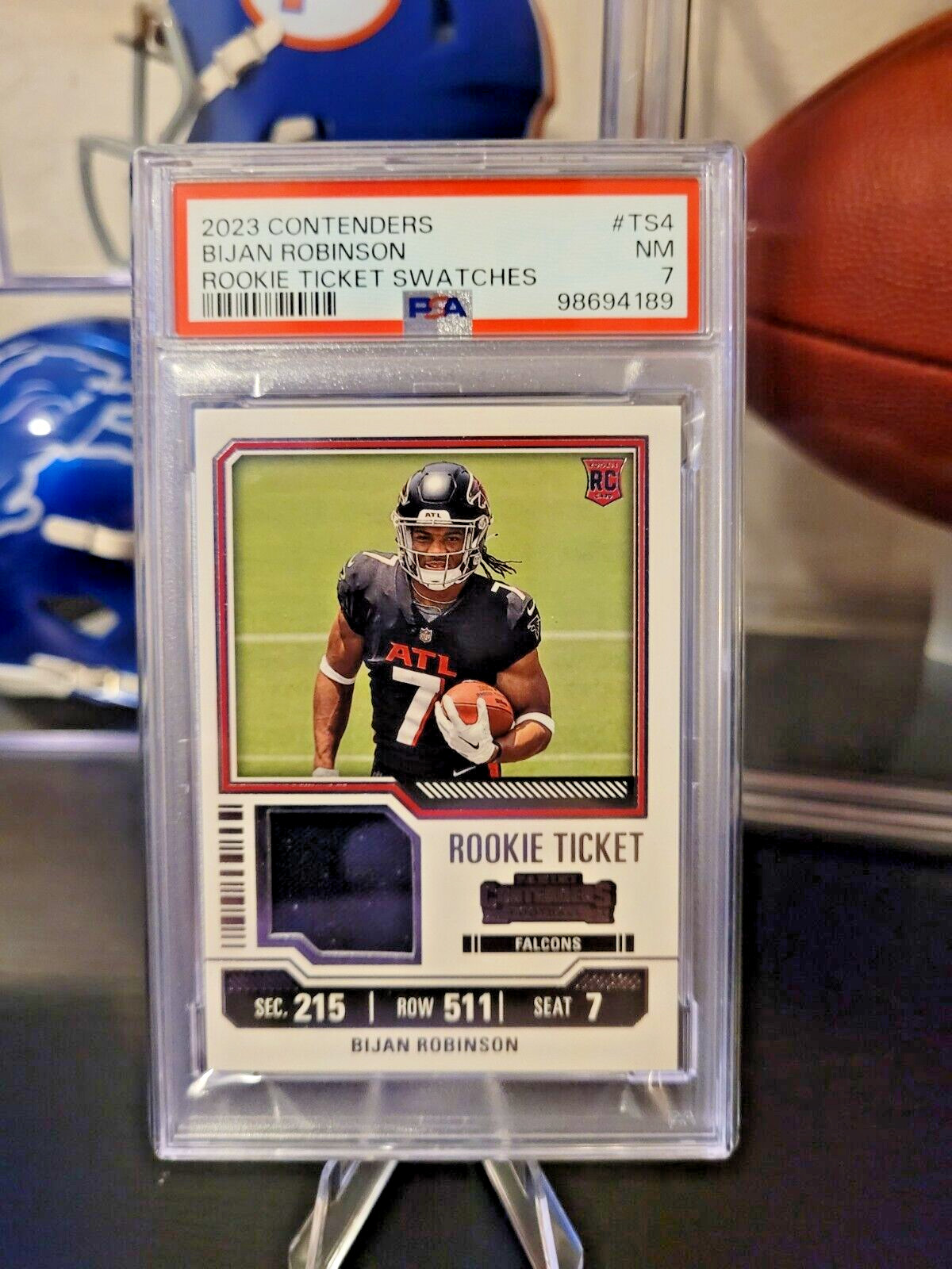 2023 Panini Contenders - Rookie Ticket Swatches #TS4 Bijan Robinson PSA 7 NM