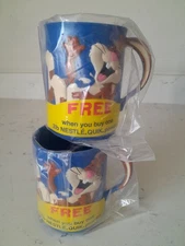 Vintage NOS 1980s Nestle Quik Laughing Rabbit Blue Embossed Plastic Mug Cups