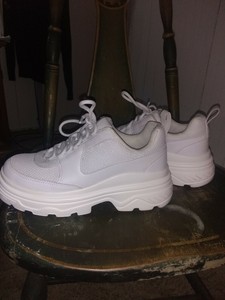 thick white tennis shoes