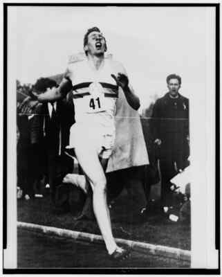 8'' x 10'' Photo 1954 Roger Bannister Crossing The Finish line in Three Minutes