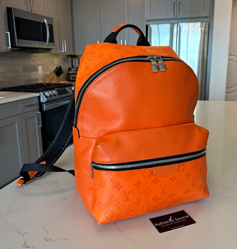 Louis Vuitton Orange Monogram Discovery Backpack Medium Zip Silver Hardware