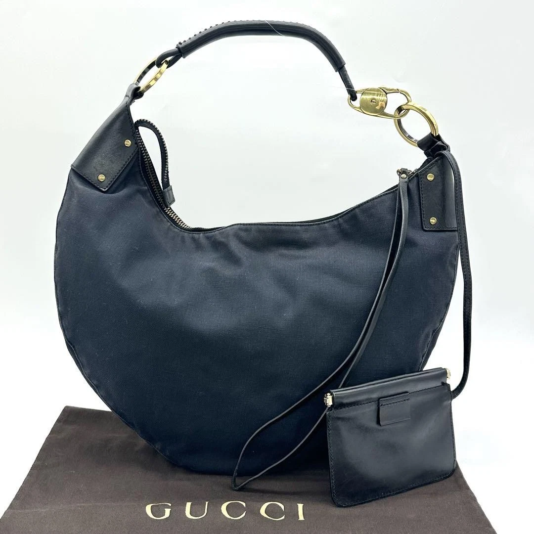 Sac à bandoulière GUCCI une demi lune toile cuir noir