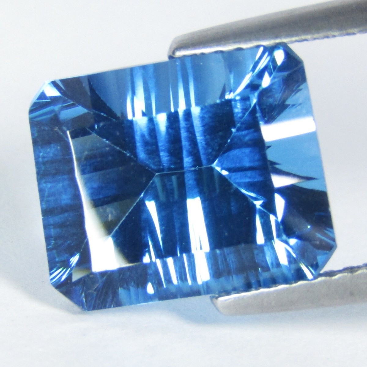 6.92Cts Sparkling Natural Swizz Blue Topaz 12x10mm Concave Cut