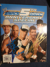 Undertaker + Kurt Angle Dual Signed PSA/DNA Magazine Auto COA Gold Bluer HOF