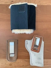 Set of Three Hunting Accessories: Two Holsters and One Magazine Holder, Used