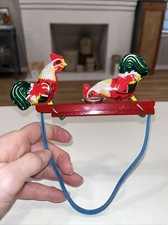 Tin Pecking Eating Rooster Cock Chickens Hand Squeeze Toy 5.75  L X 6  H