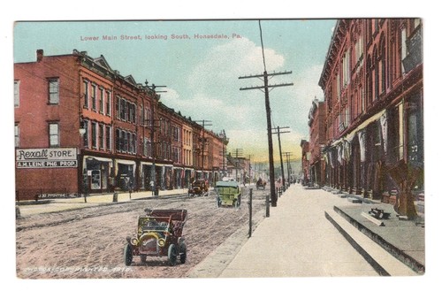 HONESDALE PA PC VIEW OF LOWER MAIN STREET REXALL SIGN CIRCA 1912