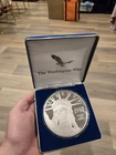 The Washington Mint 1997 4 oz Precious Metal Content .999 Fine Silver Round