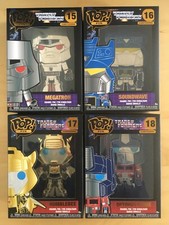 4 INSIGNIAS FUNKO TRANSFORMERS MEGATRON SOUNDWAVE BUMBLEBEE OPTIMUS PRIME POP PIN