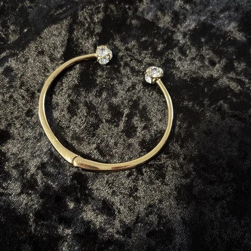Bracciale Kate Spade con cerniera tono oro con estremità a sfera strass scintillanti