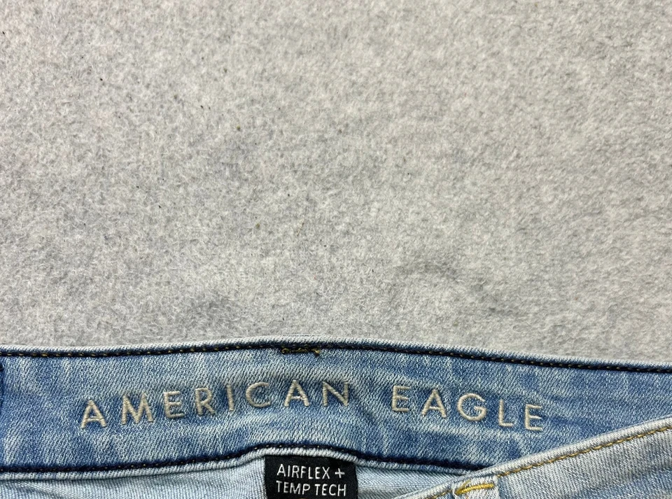 Pantalones de mezclilla American Eagle para hombre 34 X 34 atléticos ajustados desgastados retazos AirFlex Foto 3 de 4