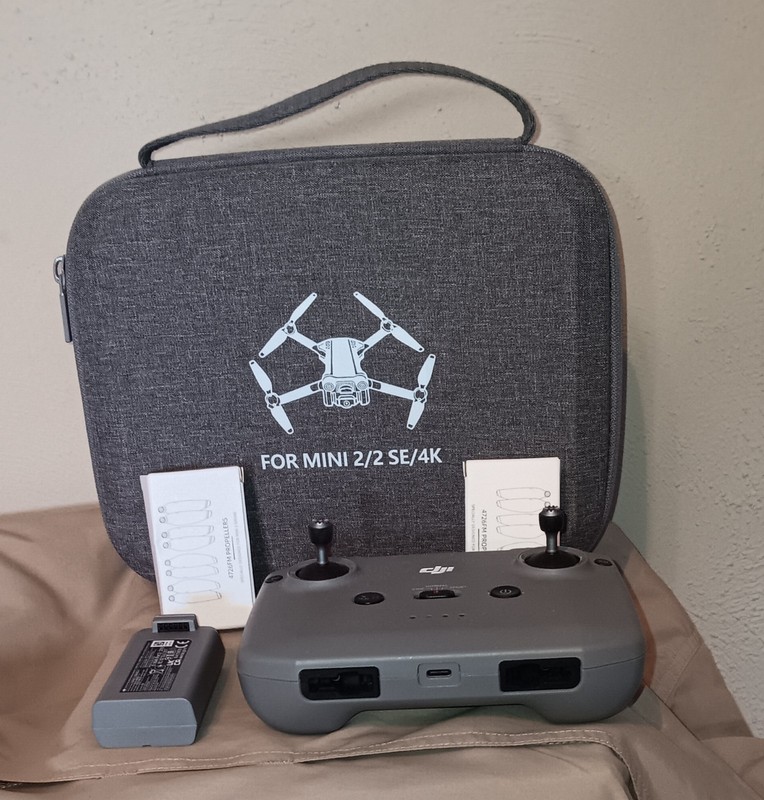 dji Drone controller 2, Battery  Propellers, Case.  All Practically New