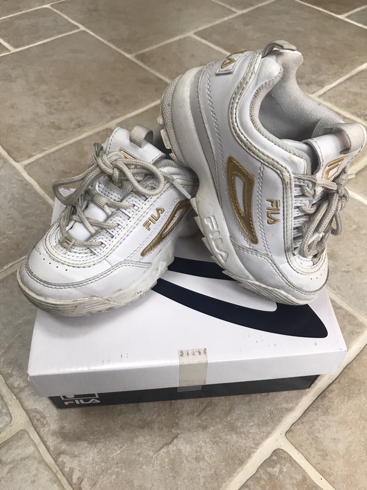 girls white fila trainers