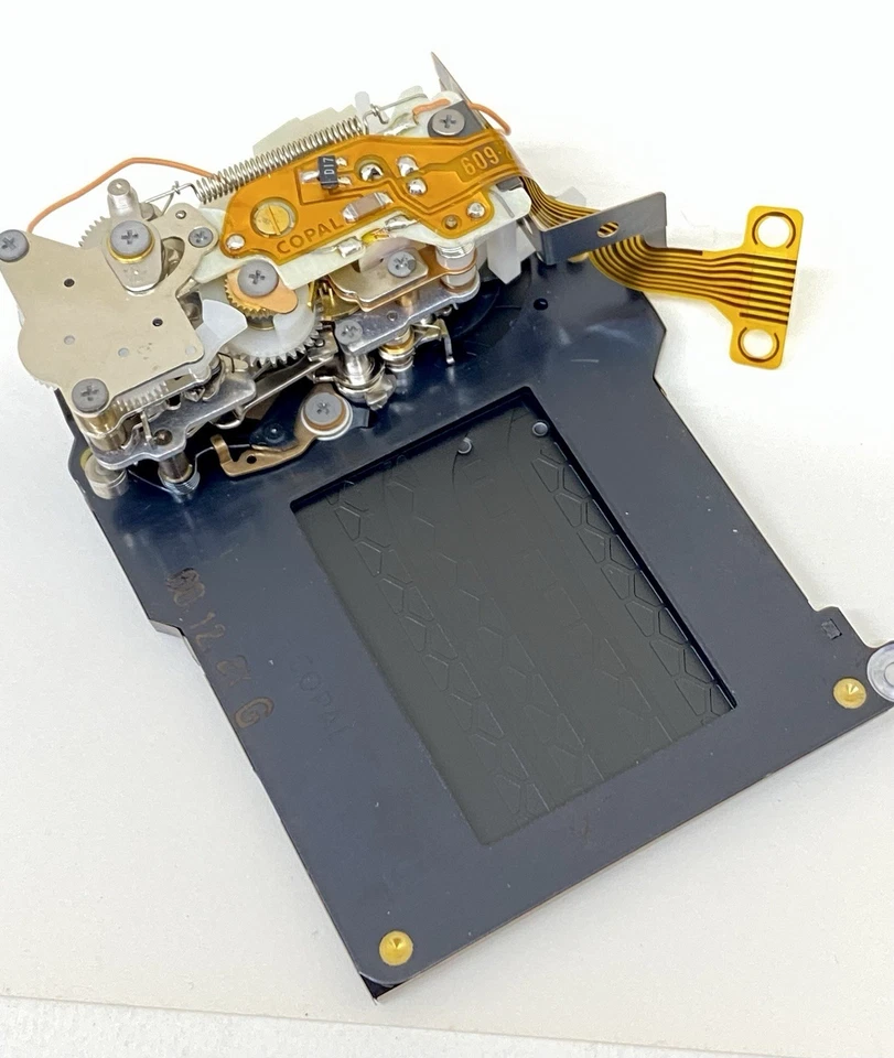 Cámara fotográfica Nikon FA OEM nueva pieza de reparación conjunto obturador hojas de panal ¡RARA! Foto 2 de 4