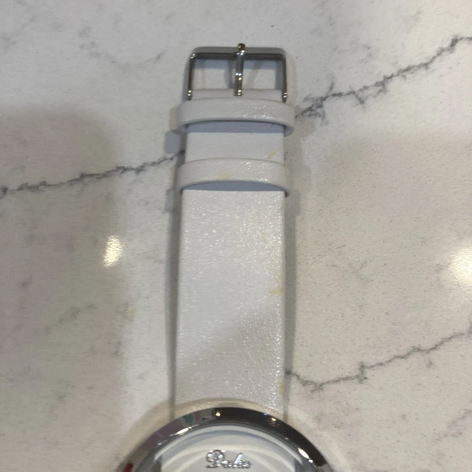 Reloj de diseñador de cuarzo para mujer corona oculta. Batería nueva Foto 2 de 4