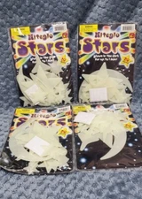 Nite Glo Glow in the dark fluorescent moons stars planets wall decoration 4 paks