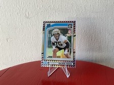 2024 Donruss Rated Rookie Taliese Fuaga Football Emoji Border